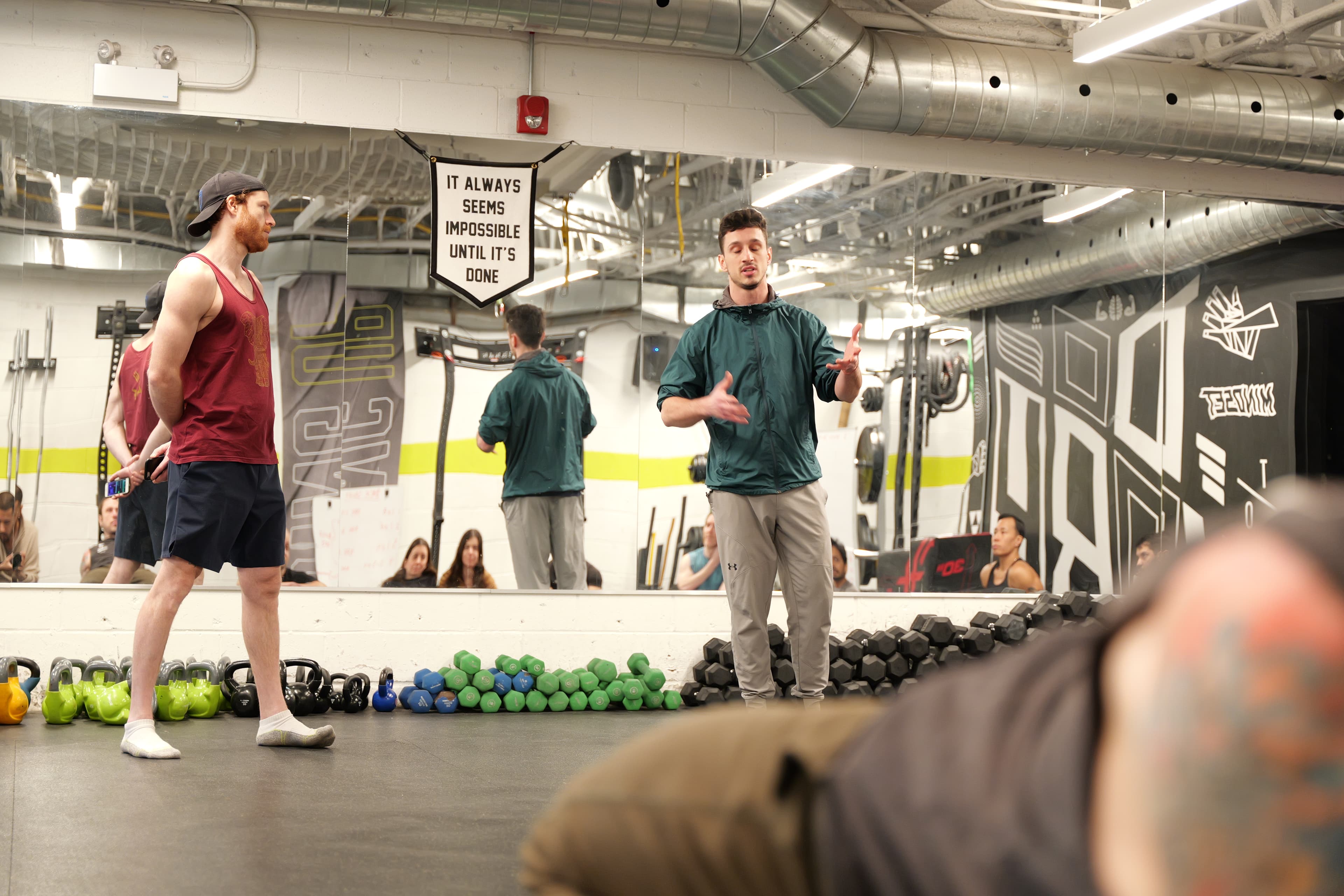 Jonny coaching a handstand class